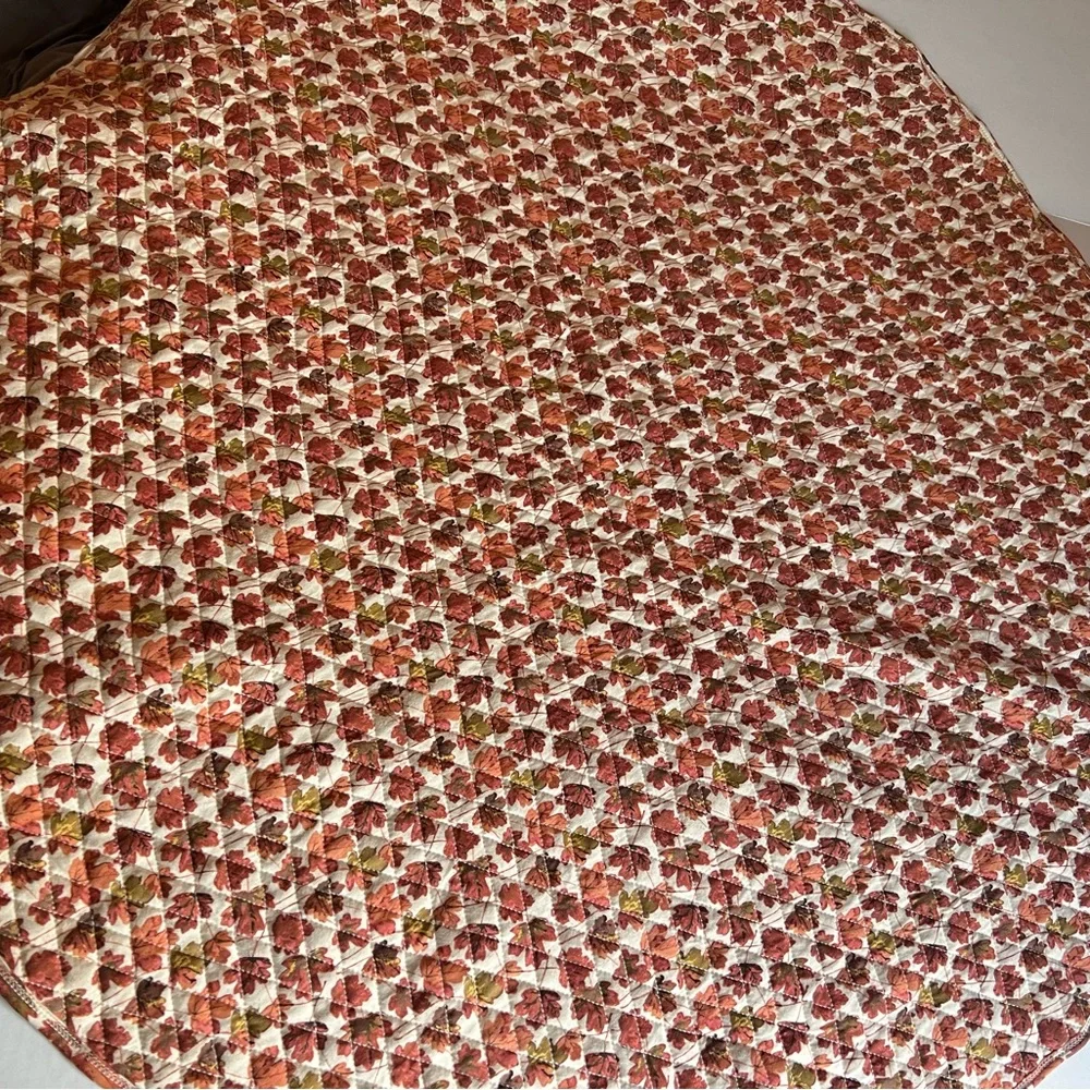 Kate Quinn round quilted play mat in autumn leaves